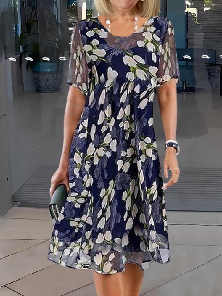 Doppelte tunika | kleid mit blumenmuster