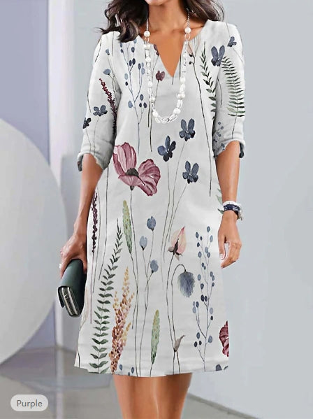 Doppelte tunika | kleid mit blumenmuster