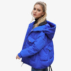 Damen Pufferjacke mit Kapuze | Polyester mit Oversized-Passform & Großen Fronttaschen | Verstellbarer Kordelzugsaum zum Schichten | Schmid
