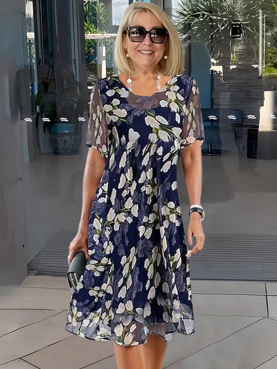 Doppelte tunika | kleid mit blumenmuster