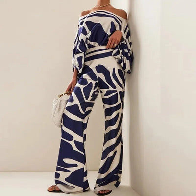 Zweiteiliges damen  set mit asymmetrischem oberteil & weitem bein | satiniertes outfit im retro-style für events & sommer