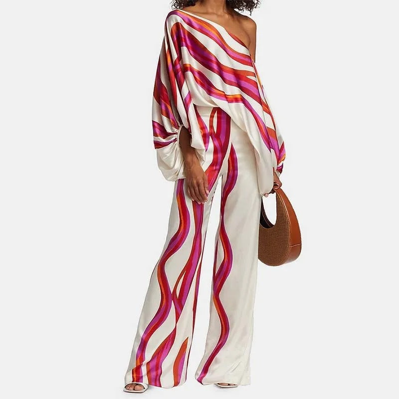 Zweiteiliges damen  set mit asymmetrischem oberteil & weitem bein | satiniertes outfit im retro-style für events & sommer